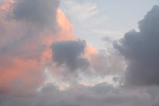 Sky filled with pink and grey clouds